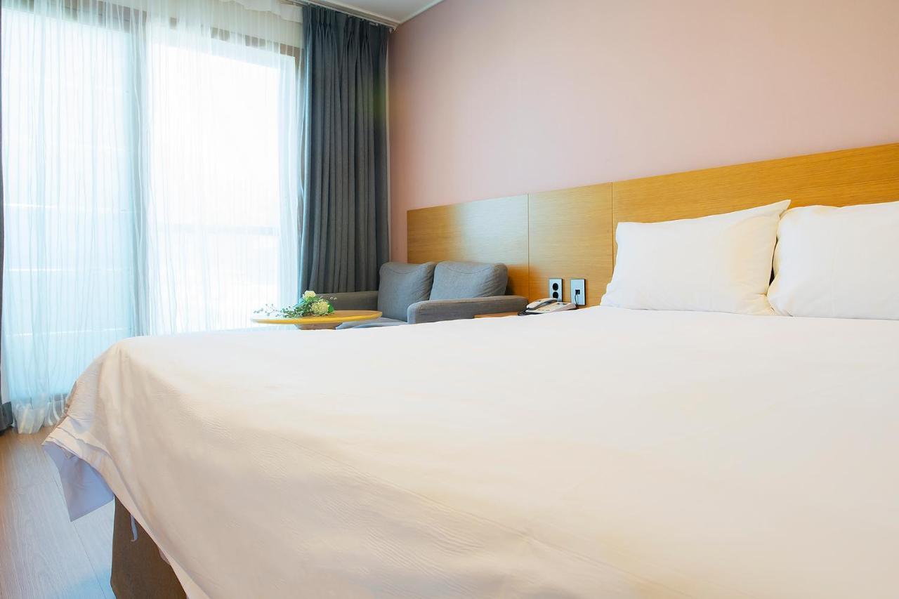 Sims Hotel Jeju Extérieur photo